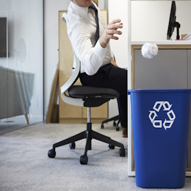 man sitting at desk. Too much sitting is harmful to mental health